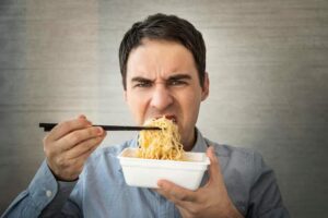 Are Instant Noodles Unhealthy? 1 (eating instant noodles)