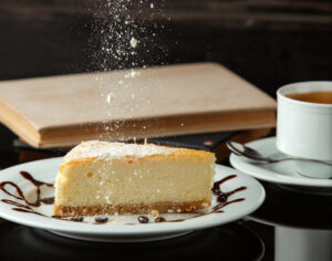 Bottled Condensed Milk: A Sweet Touch to Vietnamese Coffee and Desserts 3 Dessert served with condensed milk on a tea table, illustrating how bottled milk enhances sweet treats.