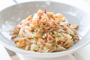 Salted Egg Noodle: The Savory Trend Taking Over Asian Cuisine 2 Salted duck eggs used as key ingredient for savory salted egg noodle flavor trend.