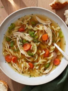 How to Make Chicken Noodle Soup: A Simple Comfort Food Guide 2 Homemade chicken soup in a pot.